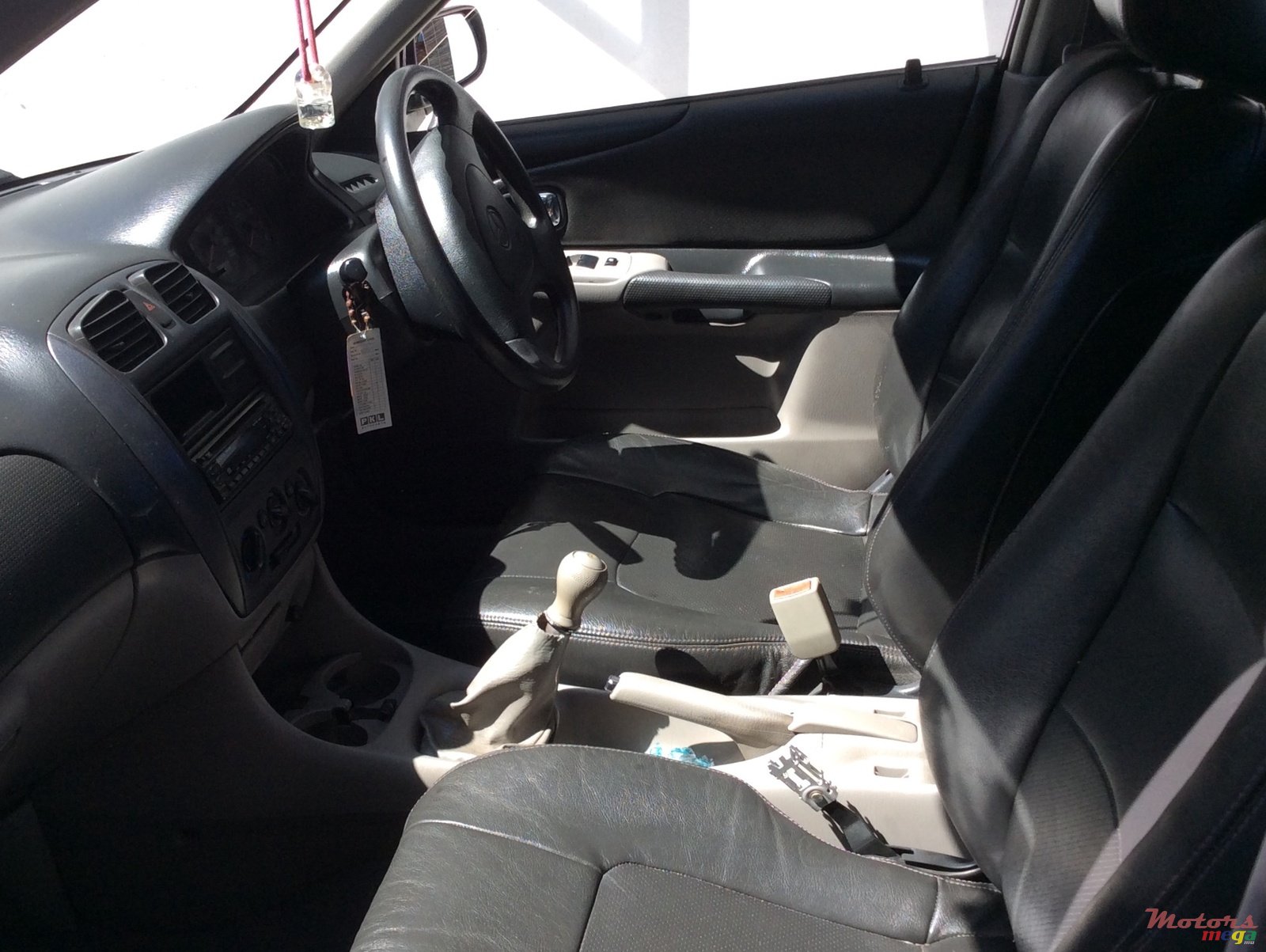 2002' Mazda 323 photo #3