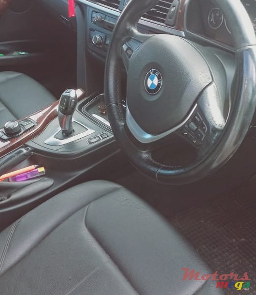 2013' BMW 116 photo #7
