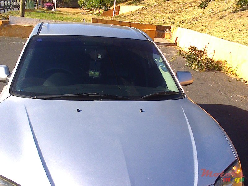 2004' Mazda 3 photo #1