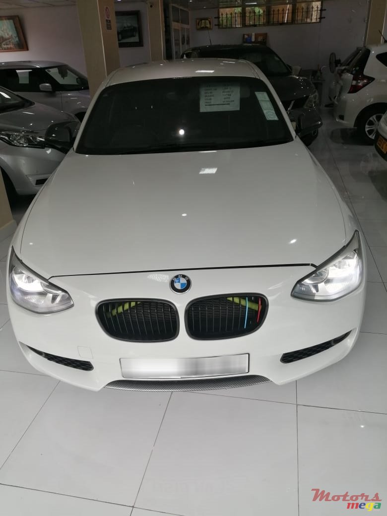 2012' BMW 116 i photo #1
