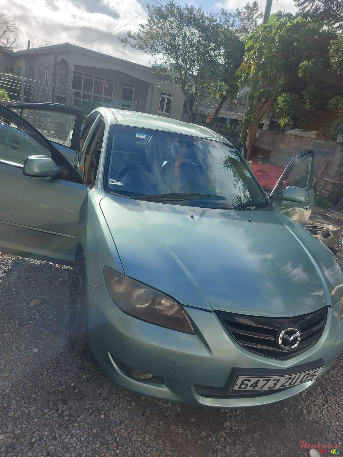 2005' Mazda 3 photo #1