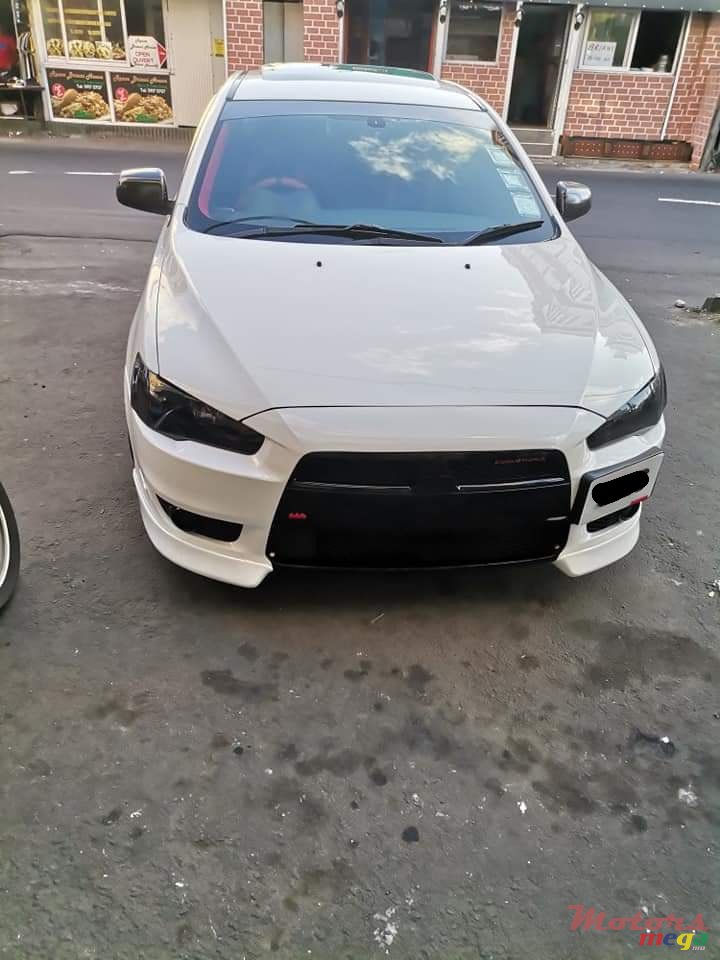 2013' Mitsubishi Lancer photo #3