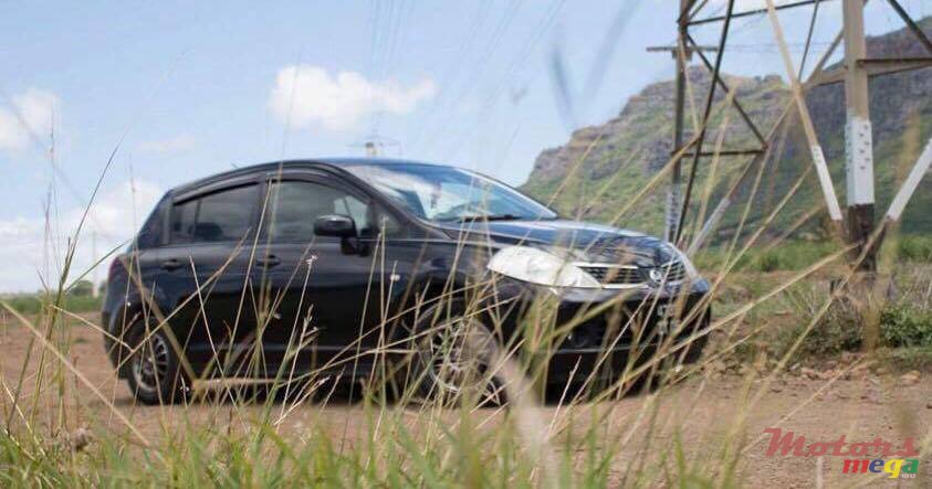 2005' Nissan Tiida full option photo #1