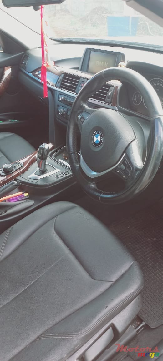 2013' BMW 116 photo #7