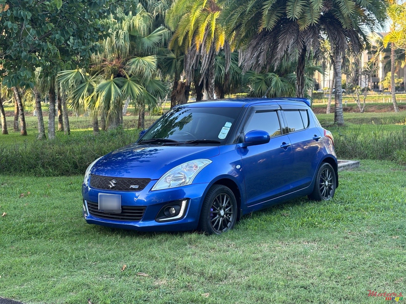 2014' Suzuki Swift photo #1