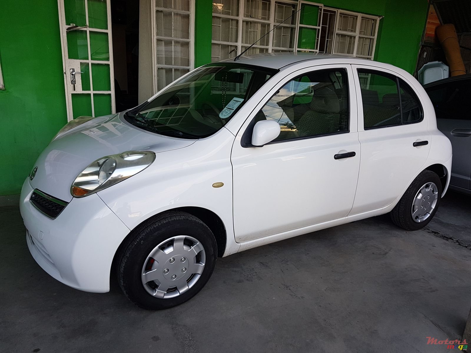 2009' Nissan March AK 12 photo #1