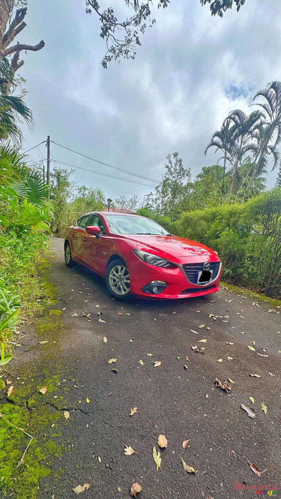 2015' Mazda 3 Deluxe edition photo #1