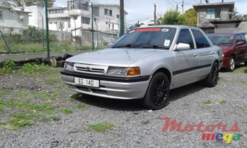 1990' Mazda 323 photo #1