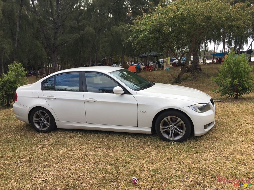 2009' BMW 318 photo #2