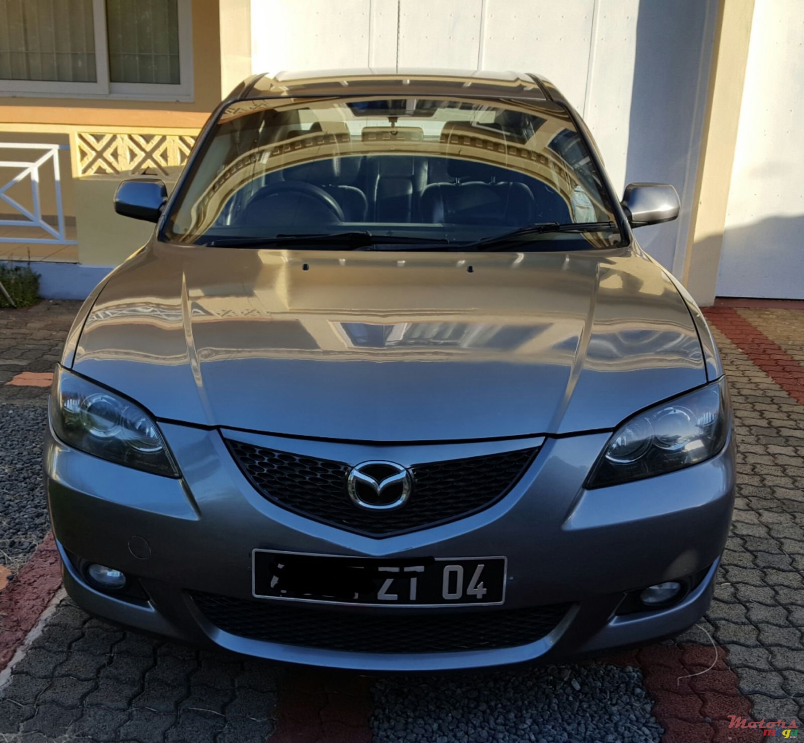 2004' Mazda 3 photo #1