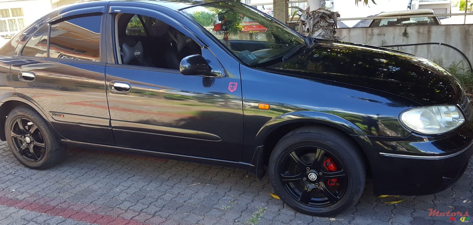 2005' Nissan Sunny photo #1