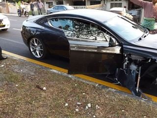 Negligent Aston Martin Employee Wrecks Rapide S Next to a Church