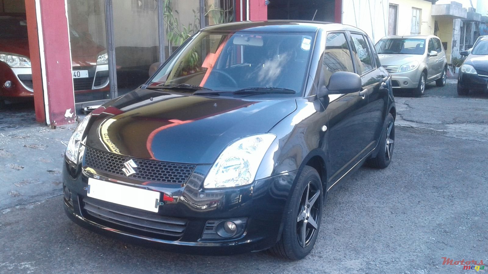 2010' Suzuki Swift photo #1