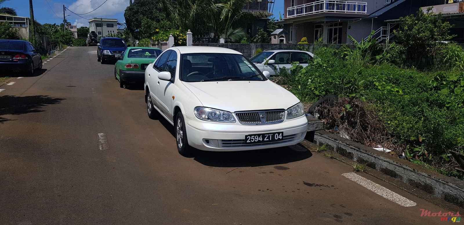 2004' Nissan Sunny photo #1