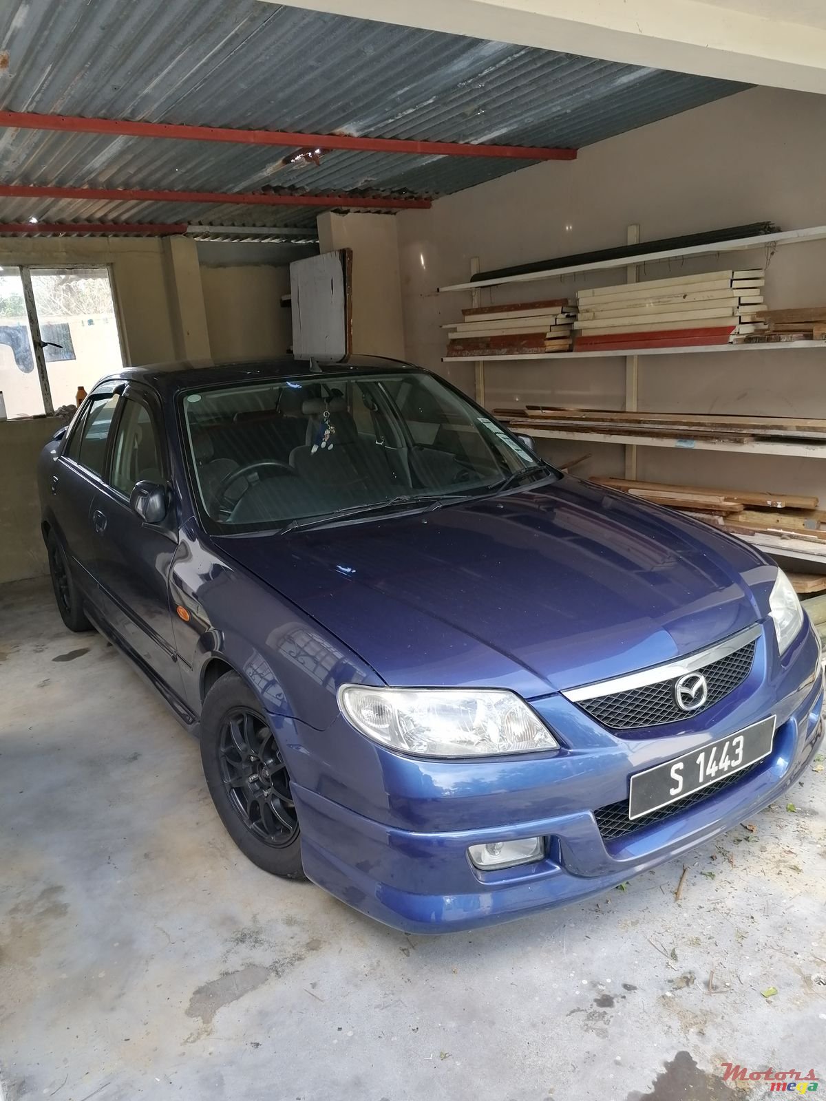 2002' Mazda 323 photo #3