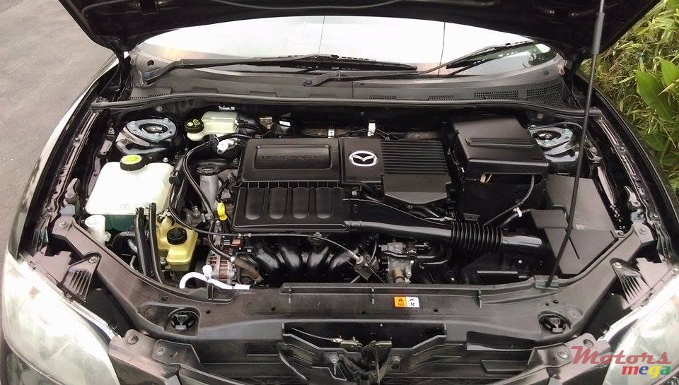 2006' Mazda 3 manual photo #4