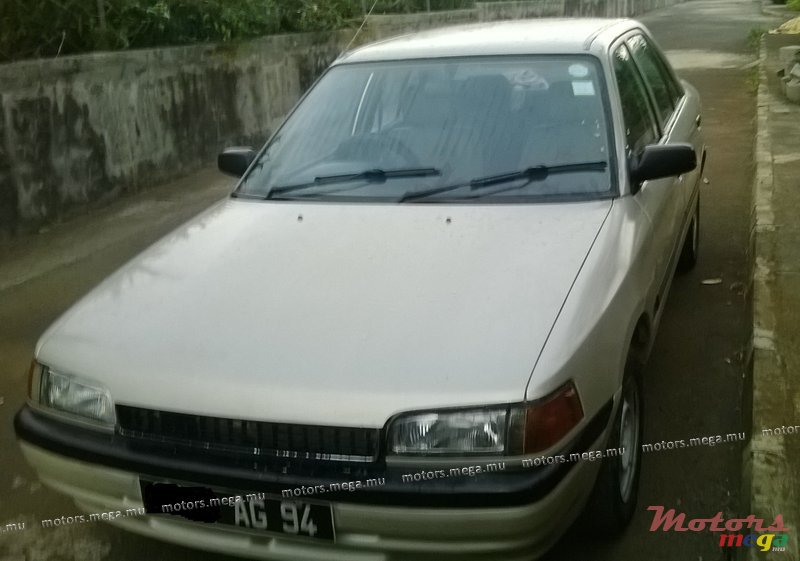 1994' Mazda 323 photo #1
