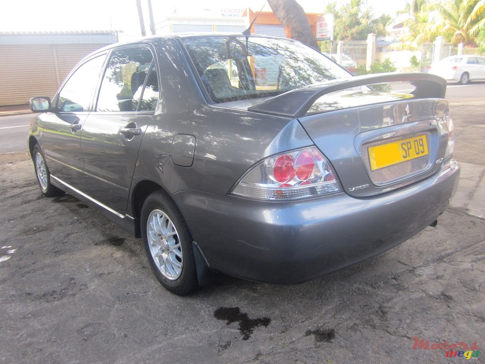 2009' Mitsubishi Lancer GLX LUXURY photo #2