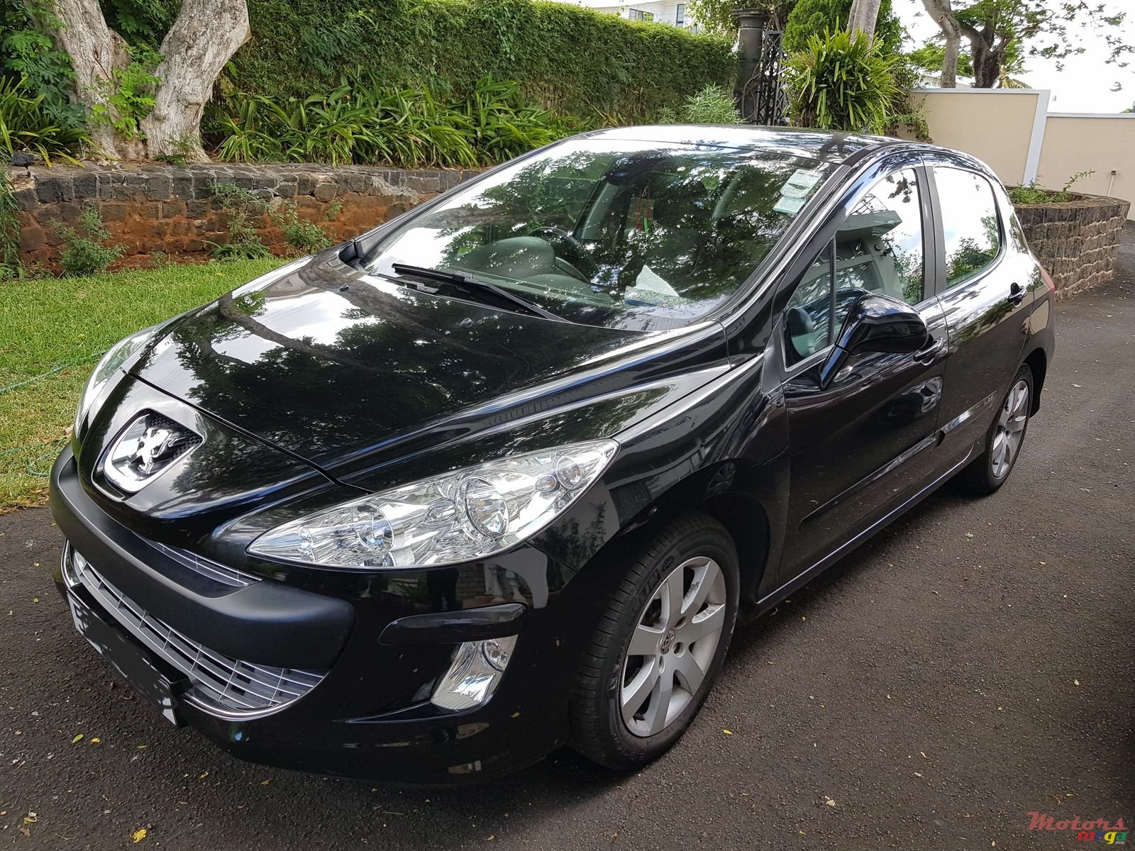 2009' Peugeot 308 photo #1