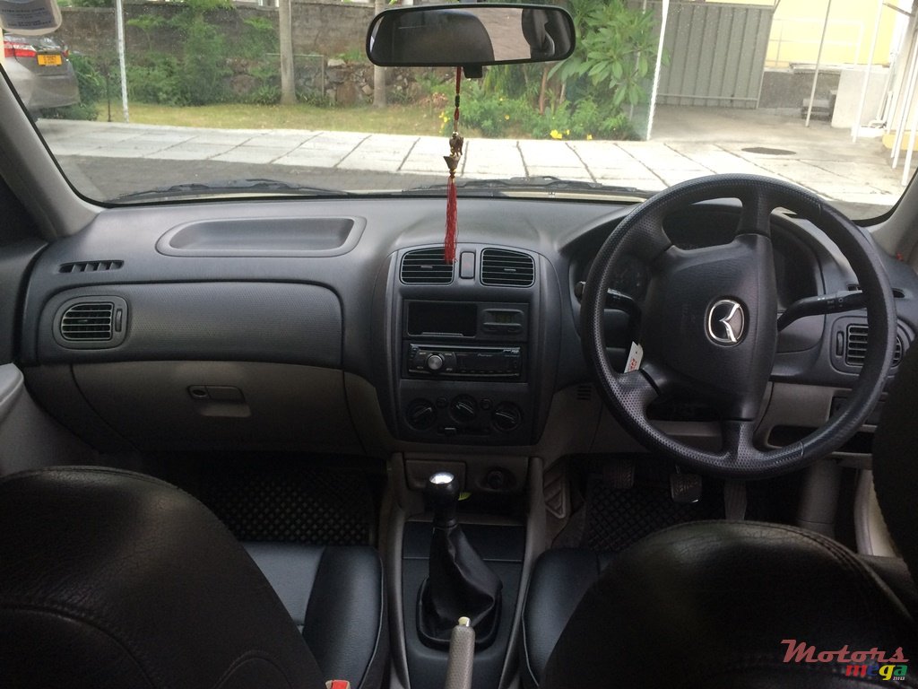 2002' Mazda 323 photo #4