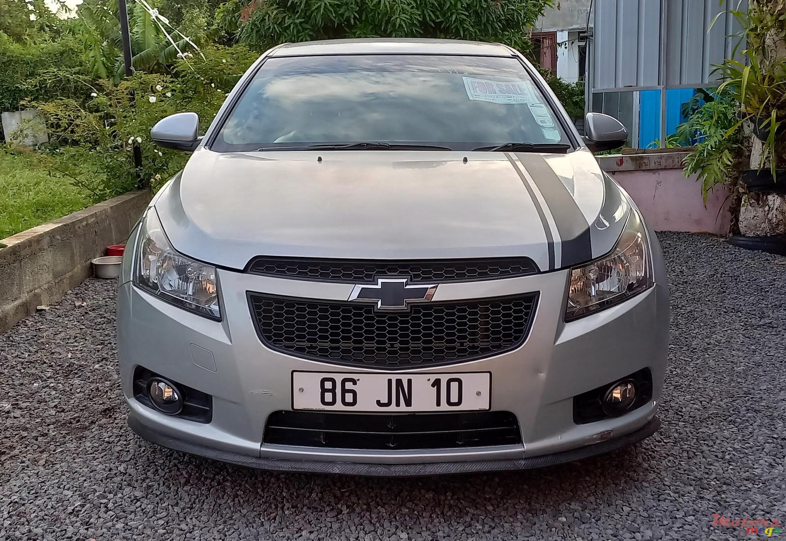 2010' Chevrolet Cruze LS photo #1