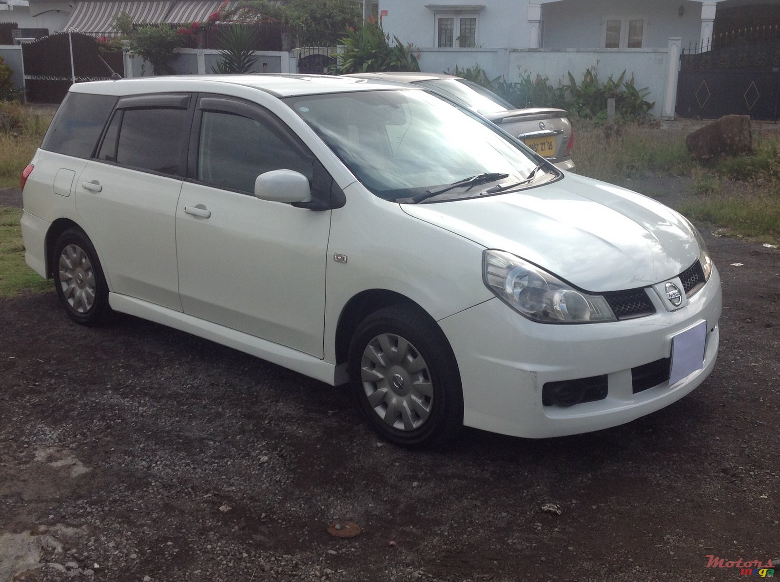 2005' Nissan Wingroad photo #2