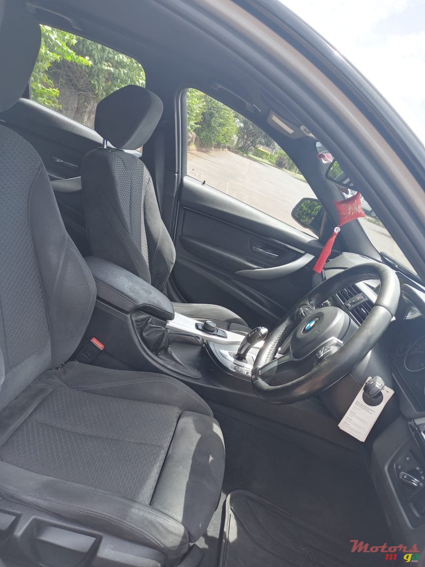 2015' BMW 318 photo #1