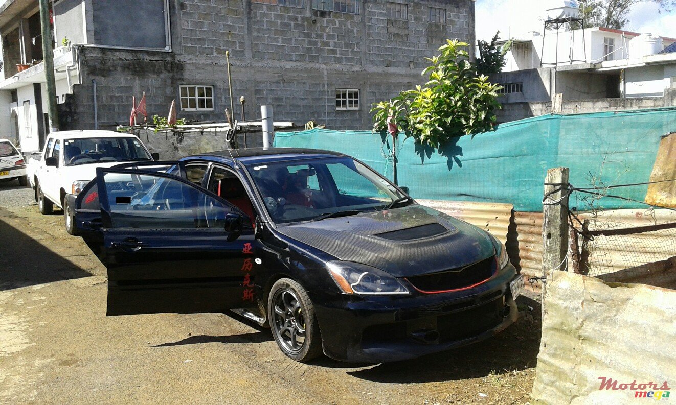 2004' Mitsubishi Lancer 4G18 photo #1