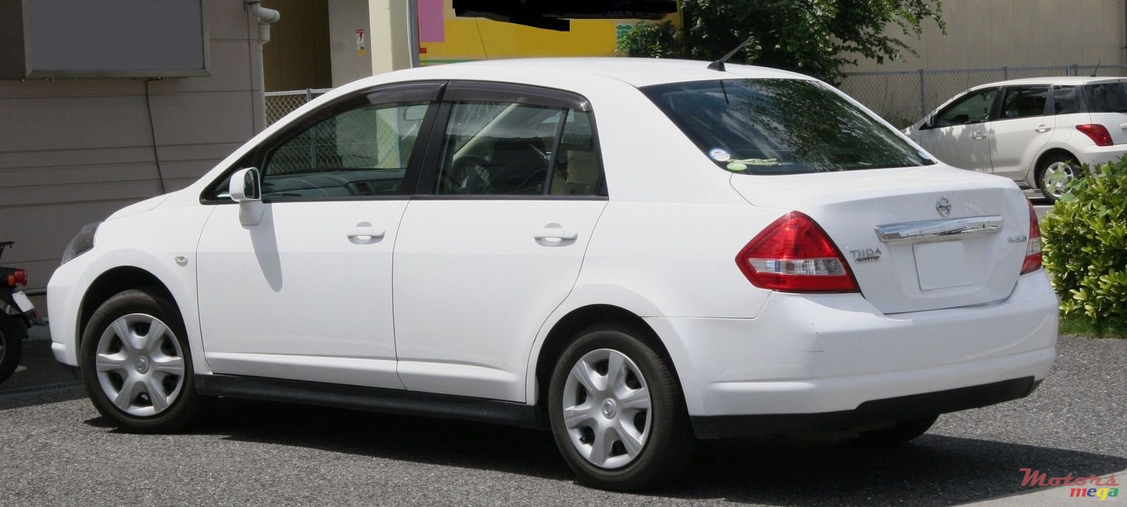 2010' Nissan Sunny dorigine photo #1