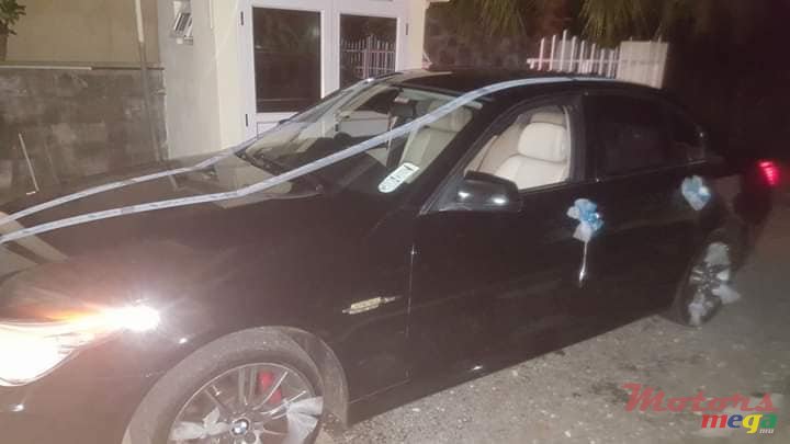 2009' BMW 520 photo #1