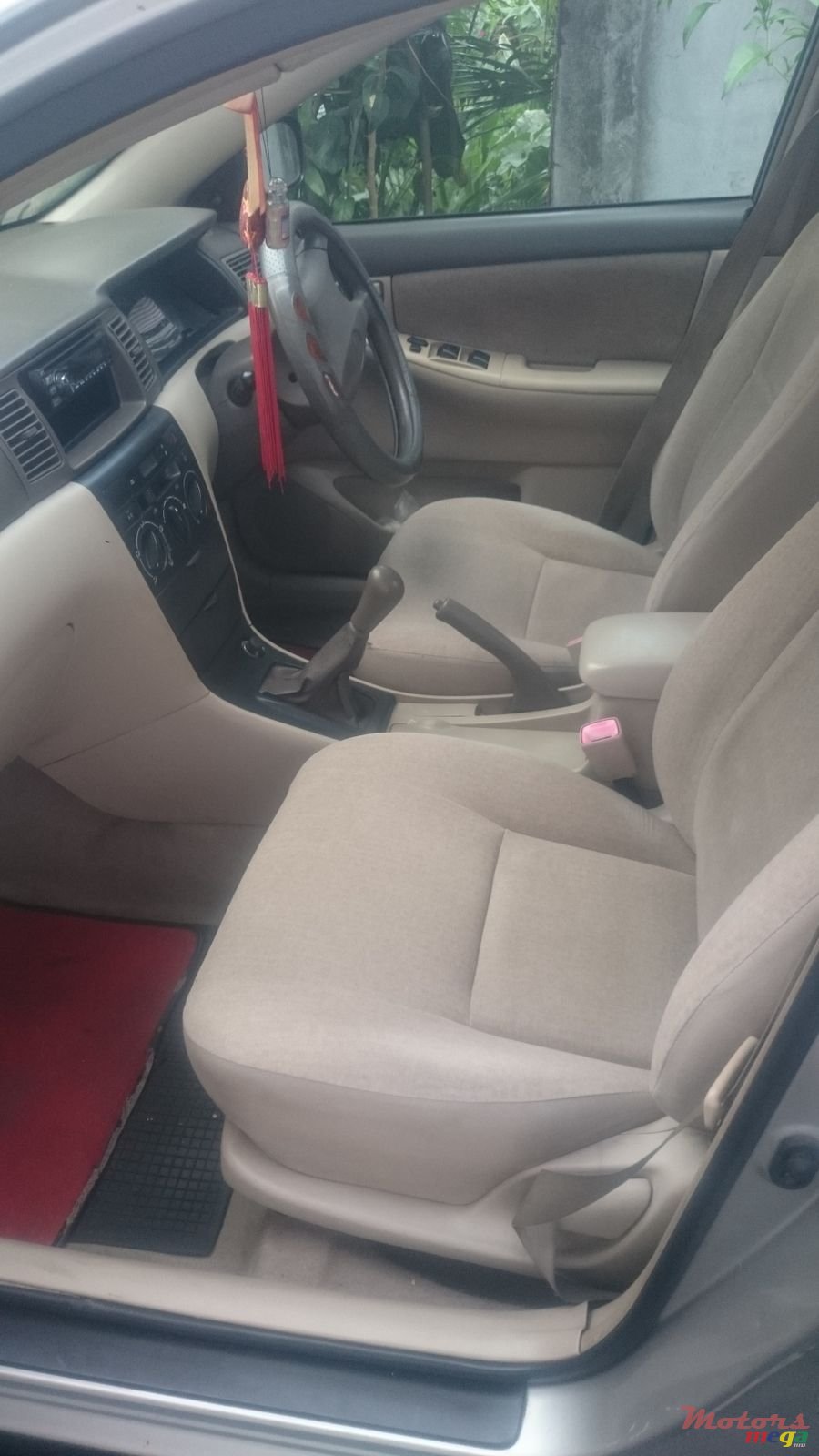 2004' Toyota Corolla NZE GLI photo #5