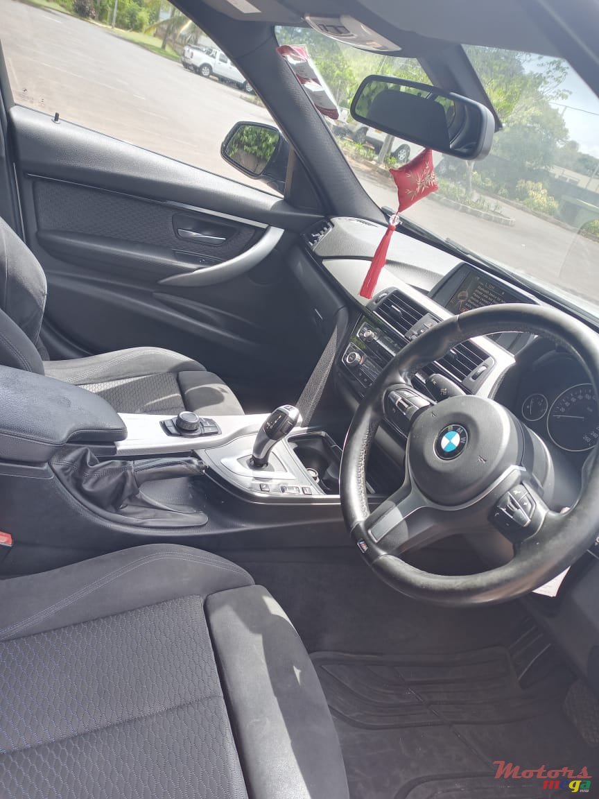 2015' BMW 318 photo #3
