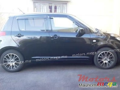 2006' Suzuki Swift photo #2