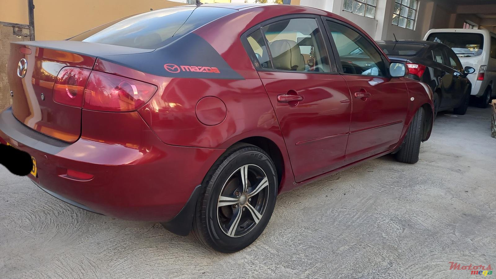 2006' Mazda 3 photo #1