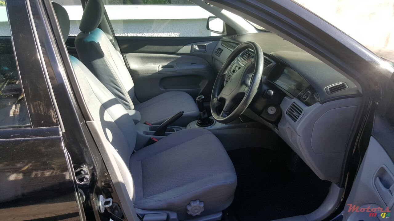 2009' Mitsubishi Lancer glx photo #4