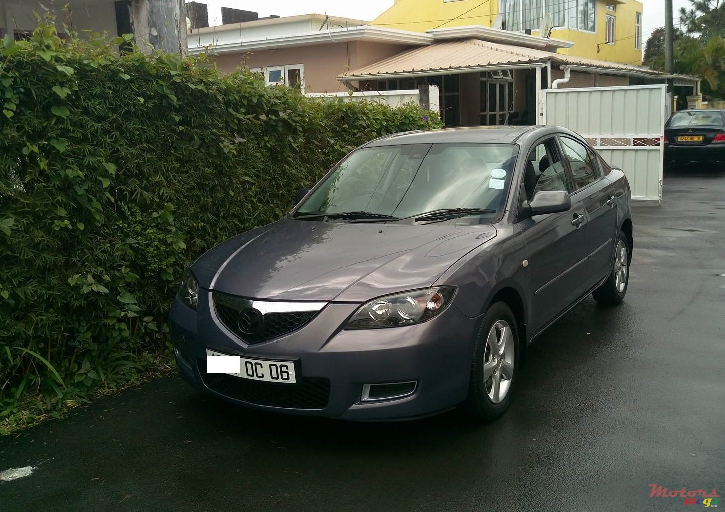 2006' Mazda 3 photo #1