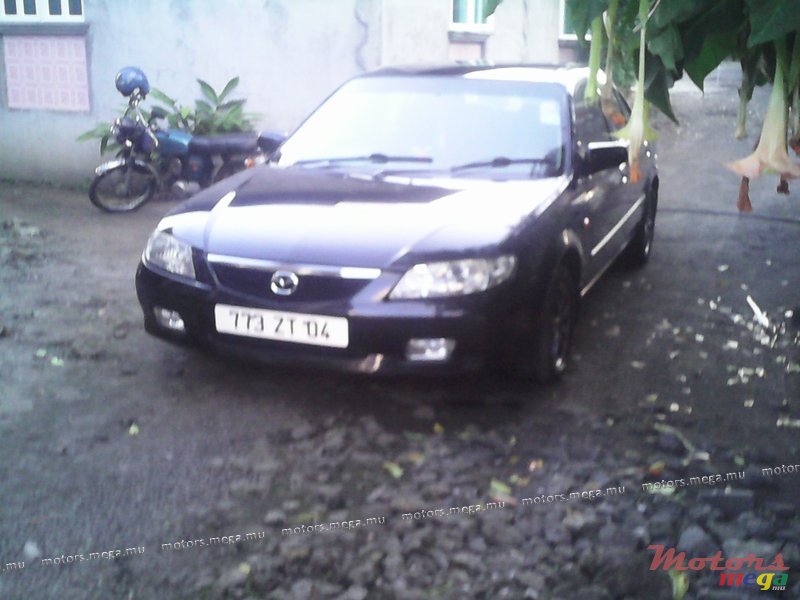 2004' Mazda 323 photo #3