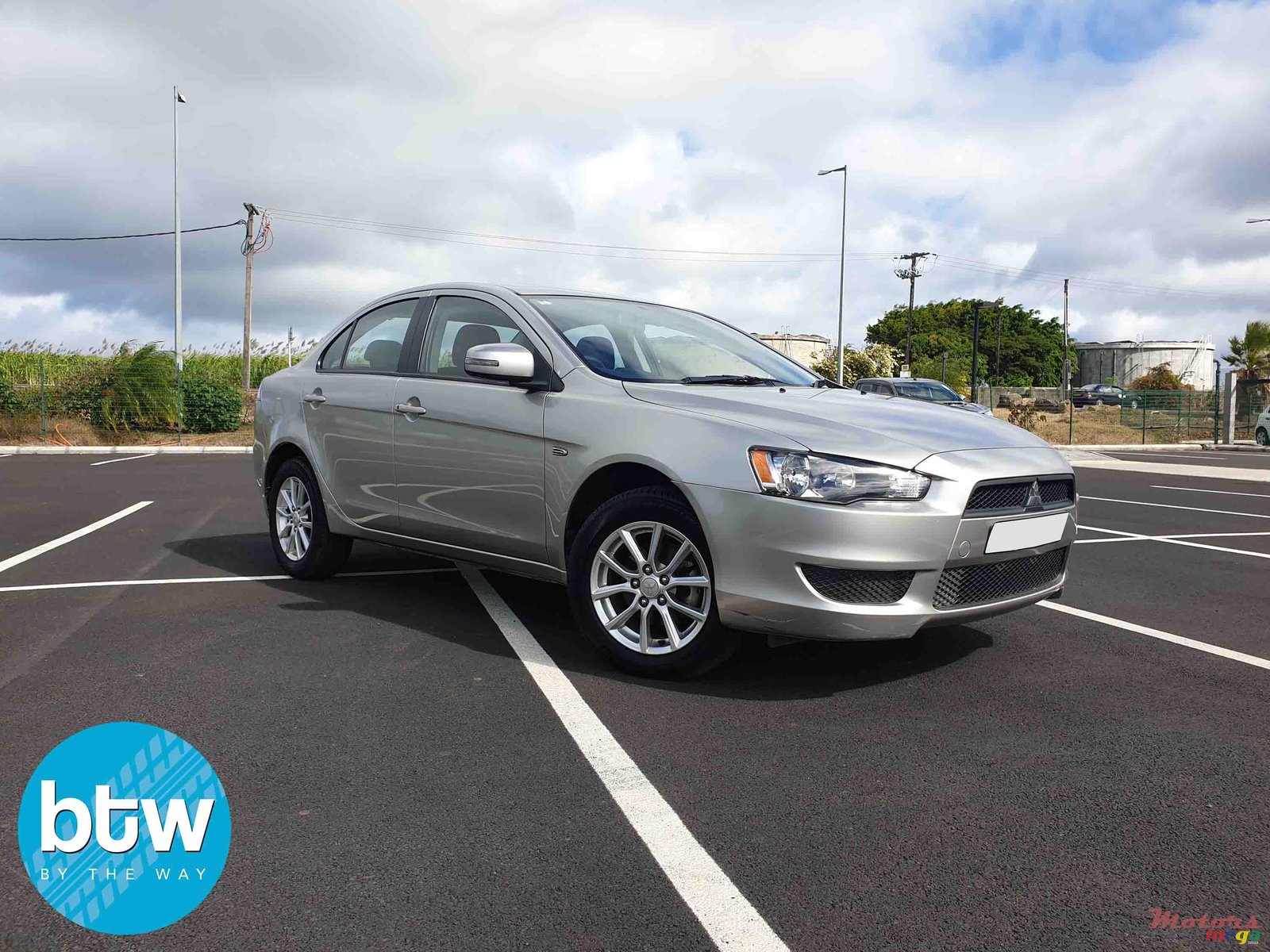 2014' Mitsubishi Lancer Ex photo #1