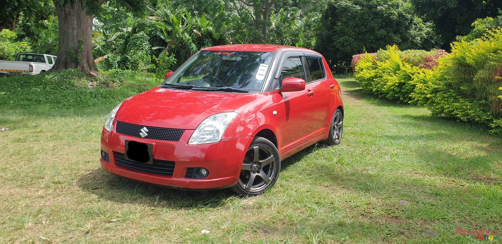 2005' Suzuki Swift 1.5 DOHC photo #2