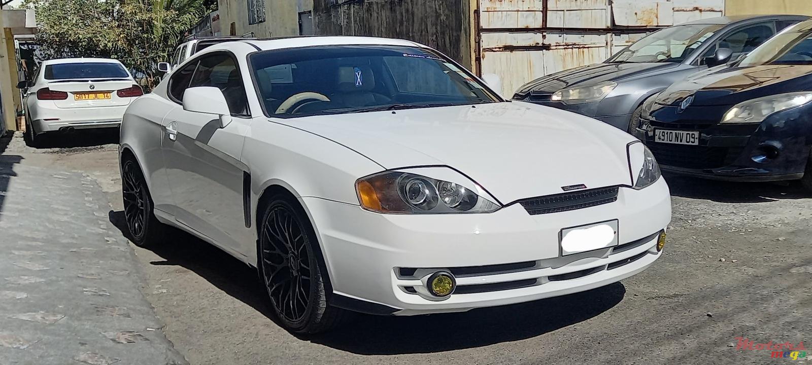 2004' Hyundai Tuscani photo #3