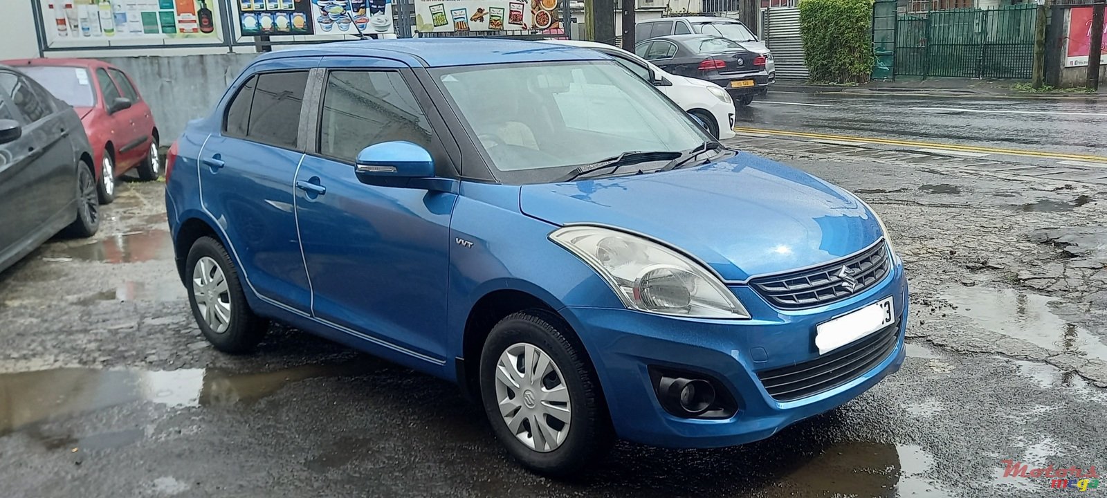 2013' Suzuki Swift Dsire photo #1