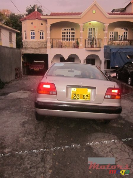 1997' Toyota Corolla EE111 XE saloon photo #4