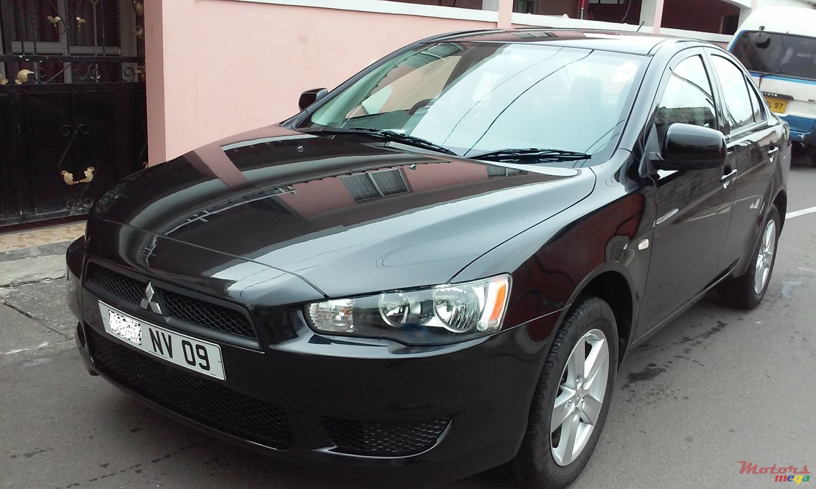 2009' Mitsubishi LANCER EX photo #1