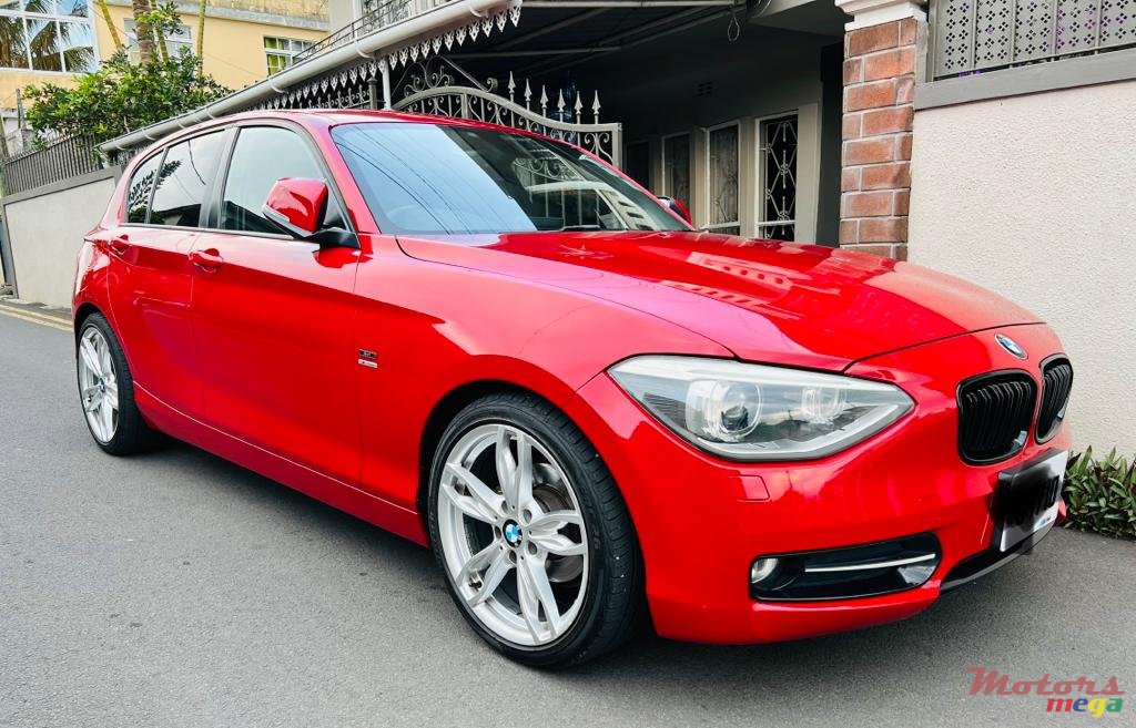 2011' BMW 116 photo #1