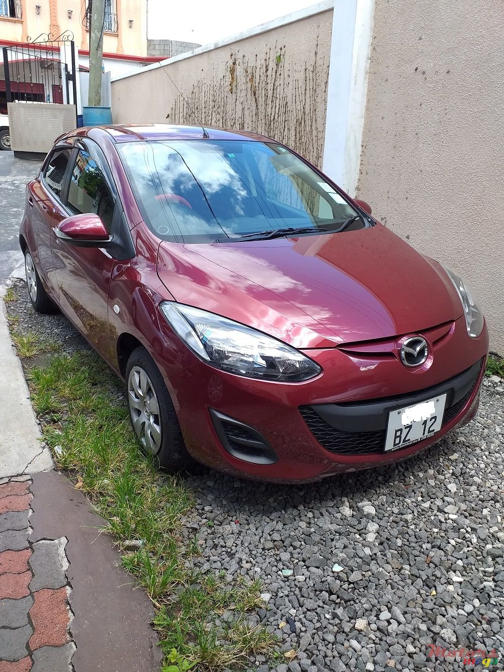 2012' Mazda Demio photo #1