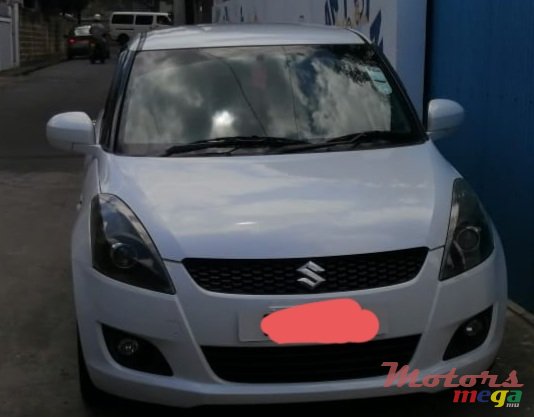 2012' Suzuki Swift photo #1