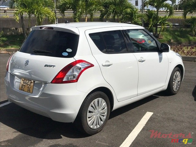 2014' Suzuki SA310 Swift photo #3