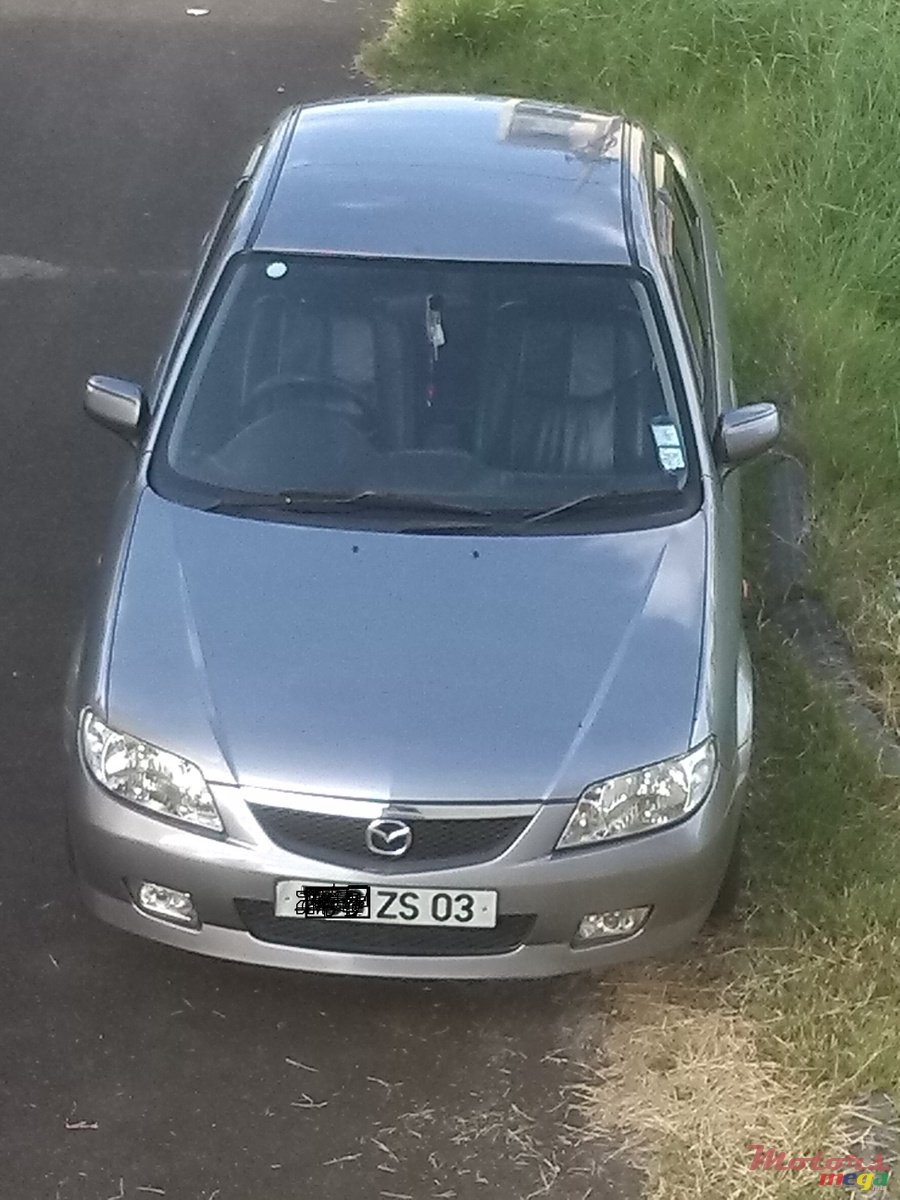 2003' Mazda 323 photo #2