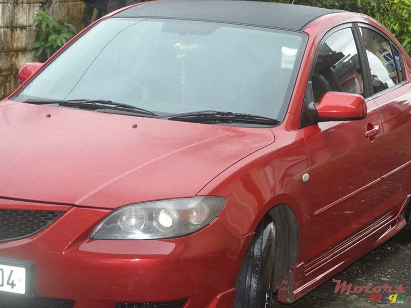 2004' Mazda 3 photo #1