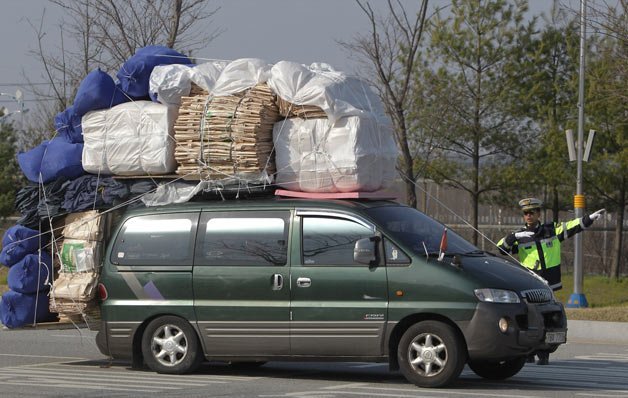 These are the Overloaded Cars of South Korean Workers Fleeing North Korea